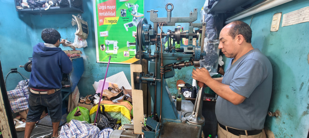 experienced peruvian footwear workers making formal footwear for men