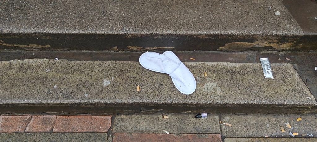 hotel slippers discarded on the streets of Edinburgh