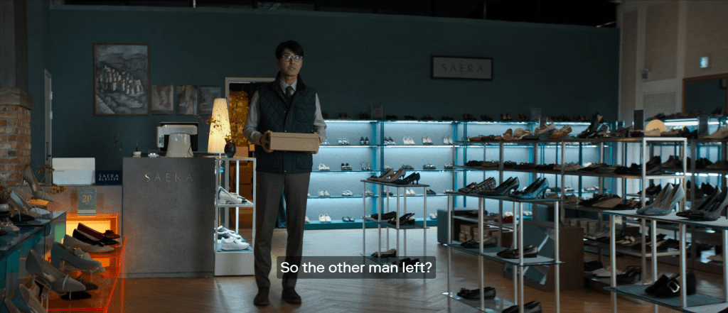 park chan-wook no other choice scene in shoe shop