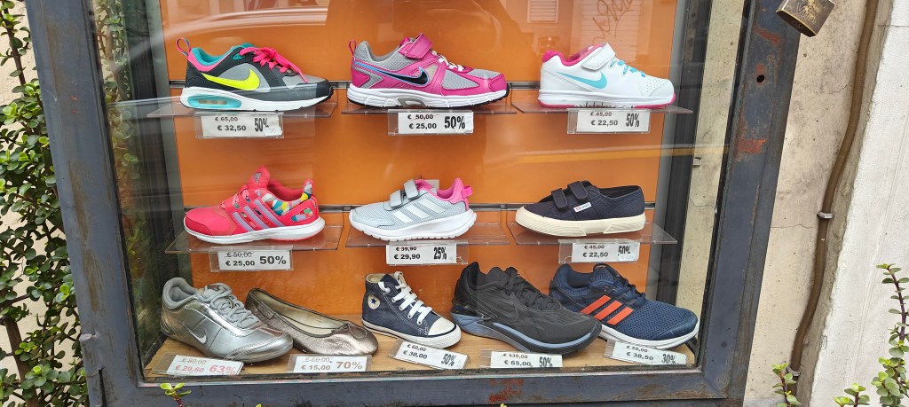 outside glass display unit nike shoes catania sports shop via etnea